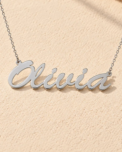 Personalised Brush Script Name Necklace in 925 Sterling Silver - Custom Nameplate - close-up of the cut-out name