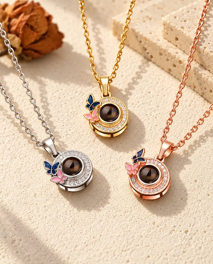 Butterfly halo circle projection necklaces in silver tone, gold tone and rose gold tone
