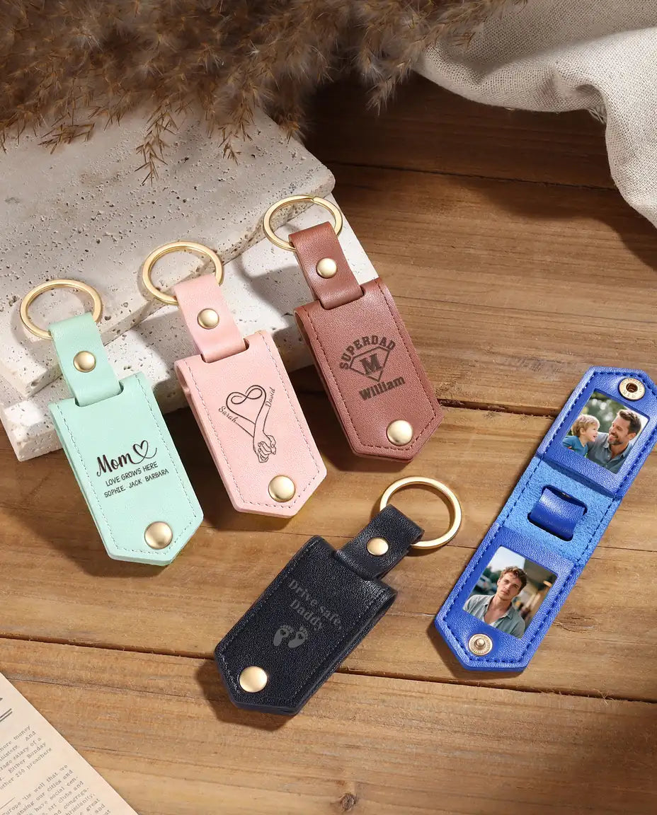 Personalised faux leather photo keyrings in mint, pink, brown, blue and black with engraved fronts