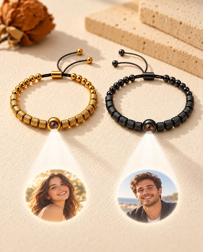 Two bead bracelets project two round photos, one of a smiling woman and one of a smiling man