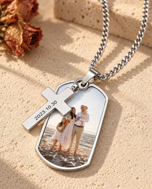 Close-up of the cross engraved with a date on the photo dog tag necklace