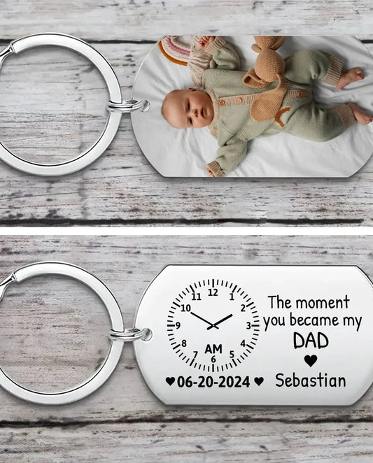 Stainless steel photo keyring with a baby picture printed on the front