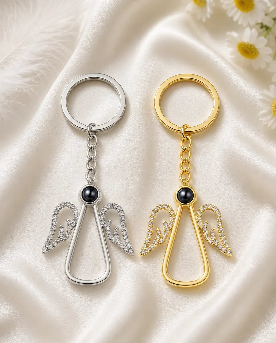 Guardian angel photo keyring in silver and gold side by side