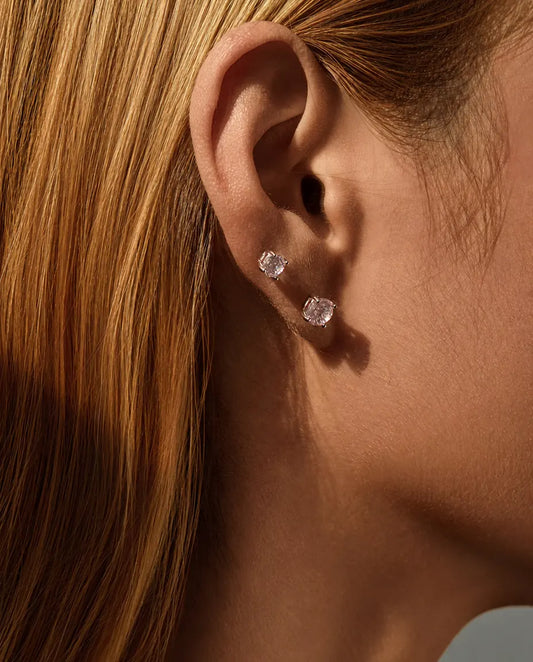 Pink Cubic Zirconia Stud Earrings in 925 Sterling Silver - 7 mm and 8 mm worn on a model