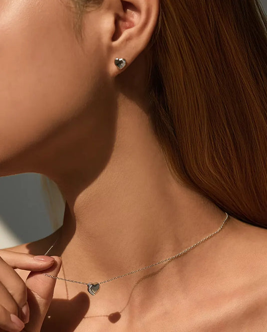 Heart Jewellery Set in 925 Sterling Silver - earring and necklace worn together on a model