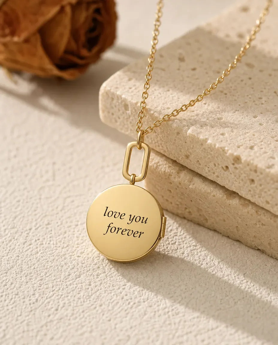 Back of the gold round locket engraved with love you forever