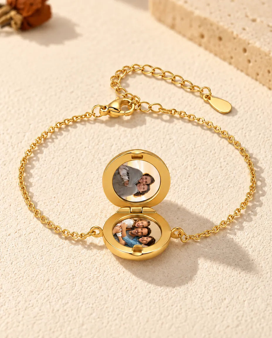 Round locket bracelet open, with two photos inside