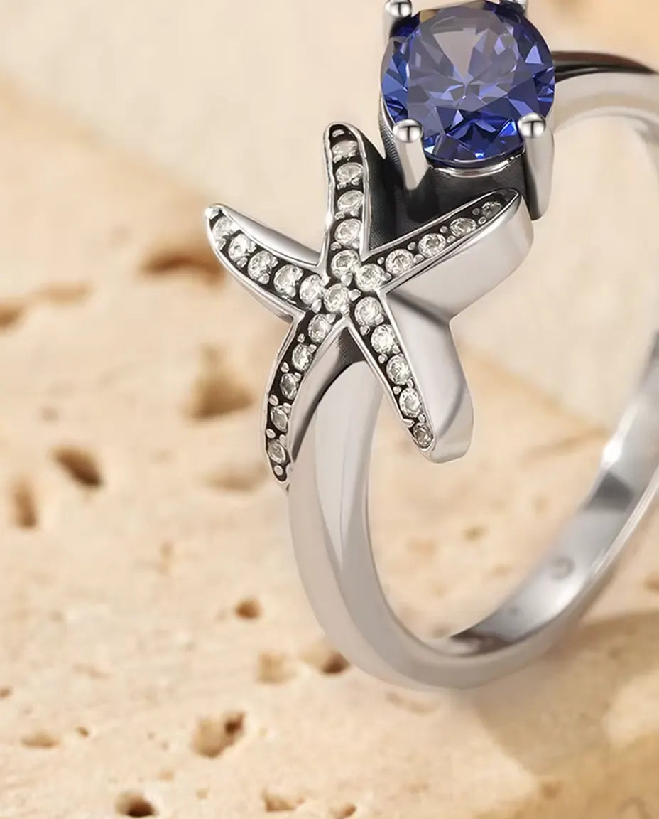 Starfish ring with oval violet zirconia in 925 sterling silver