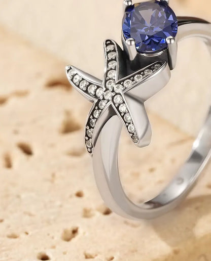 Starfish ring with oval violet zirconia in 925 sterling silver
