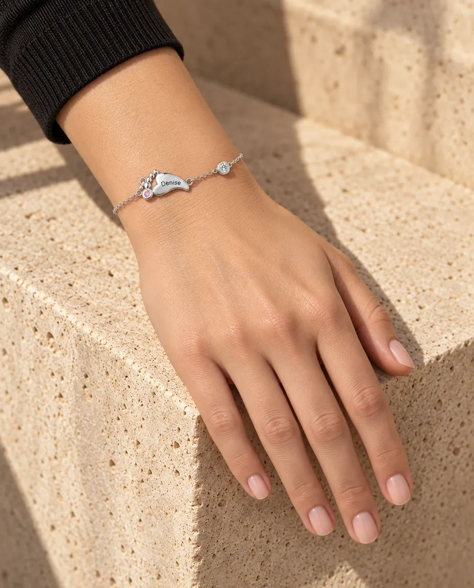 Personalised Baby Feet Birthstone Bracelet - worn on a model