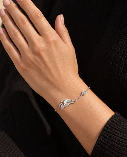 Personalised Baby Feet Birthstone Bracelet - worn on the wrist, close-up