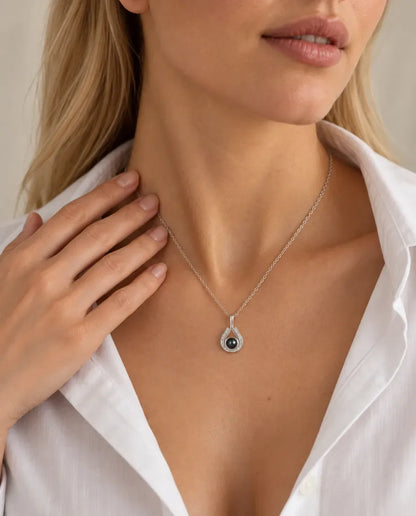 Personalised Teardrop Photo Projection Necklace in Silver - worn on a model