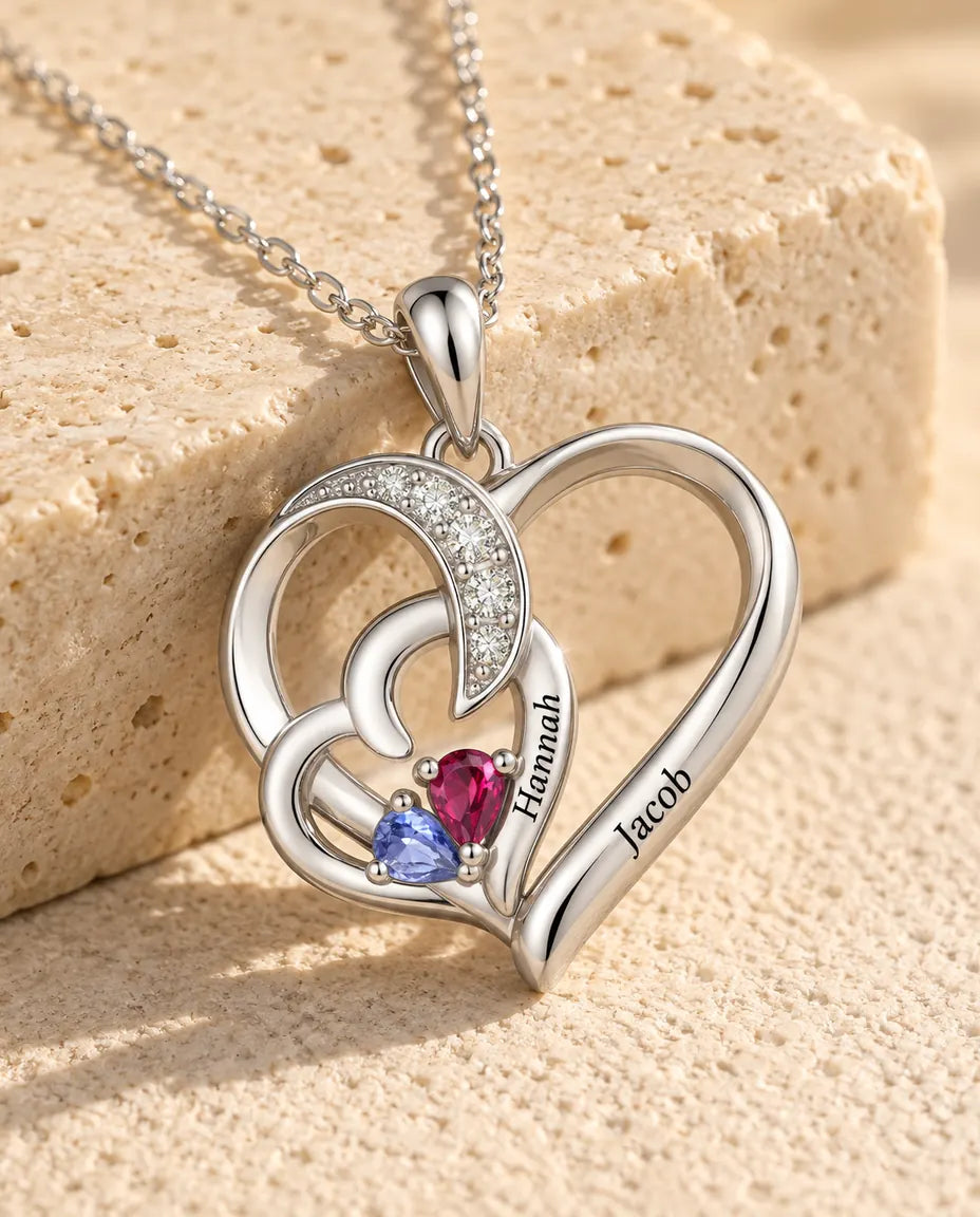 Close-up of the two interlocking hearts with a name engraved on each
