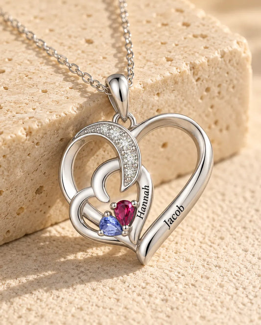 Close-up of the two interlocking hearts with a name engraved on each