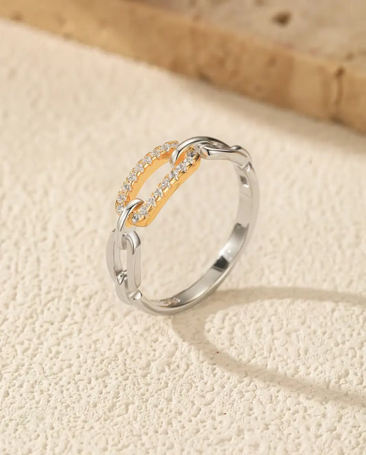 Two tone chain link ring in 925 sterling silver with a gold tone pave bar