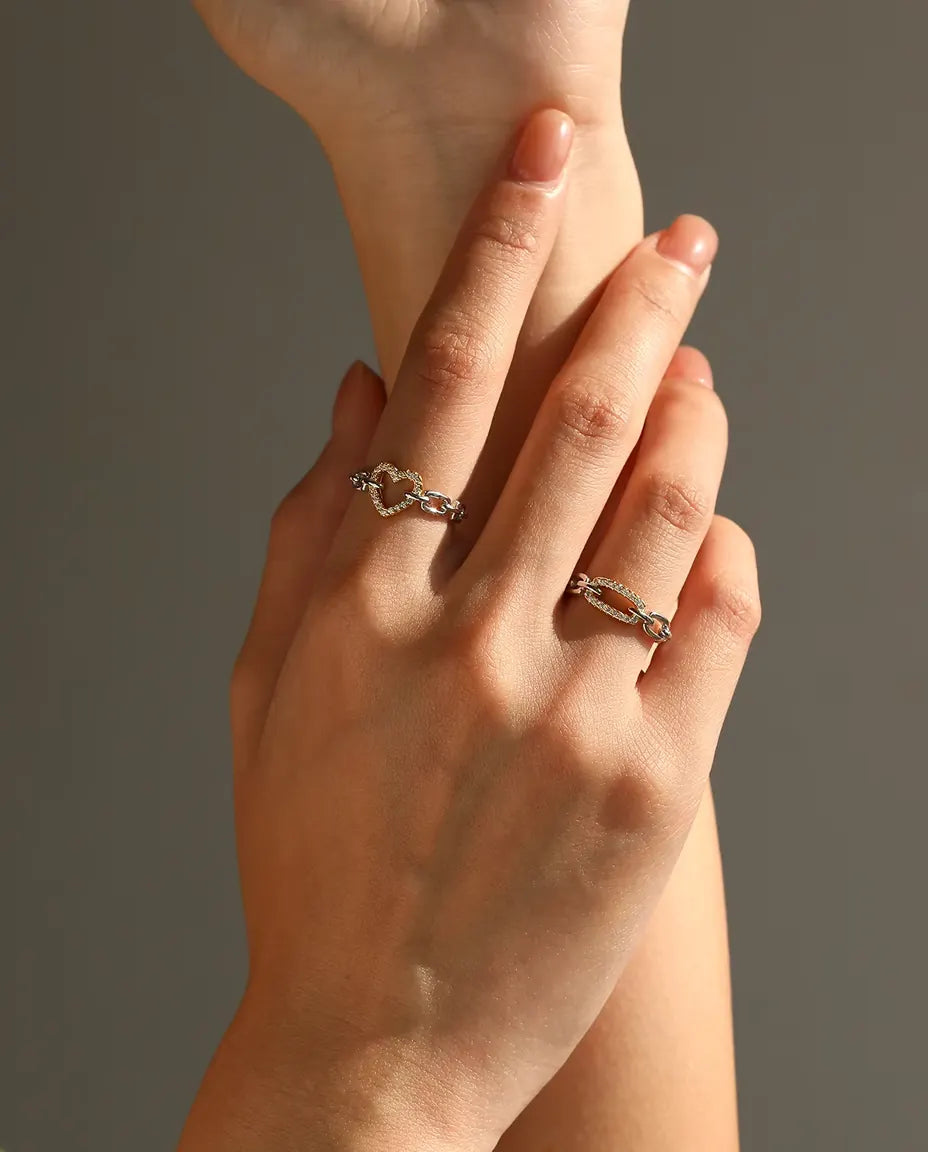 Two tone chain link ring in 925 sterling silver with a gold tone pave bar