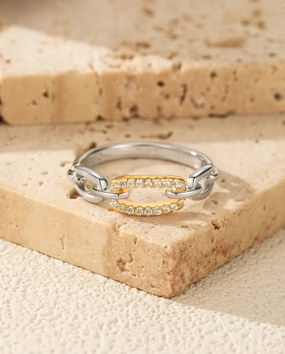 Two tone chain link ring in 925 sterling silver with a gold tone pave bar