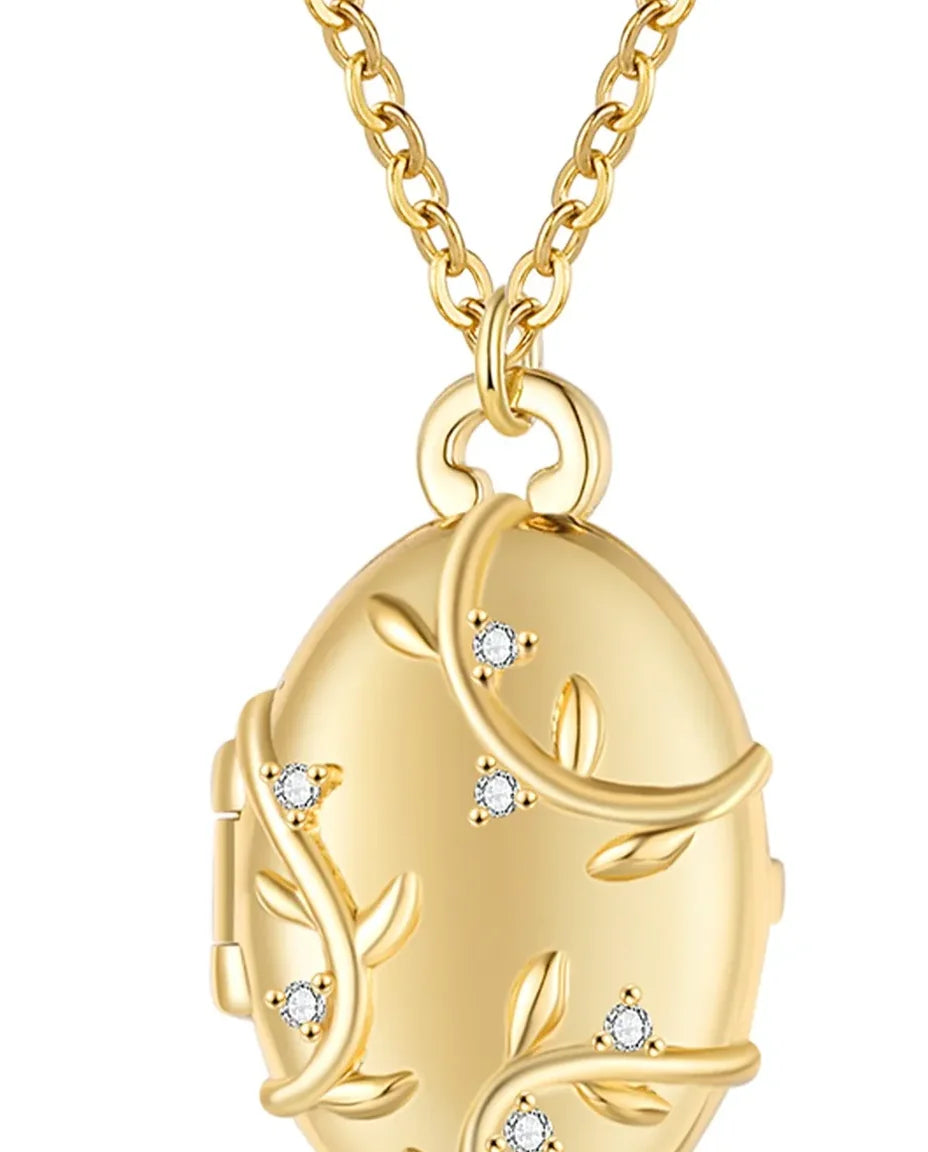 Personalised vine and crystal oval photo locket necklace holding two pictures, gold